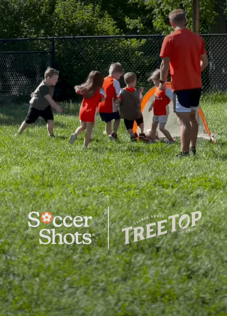 Group of kids playing soccer