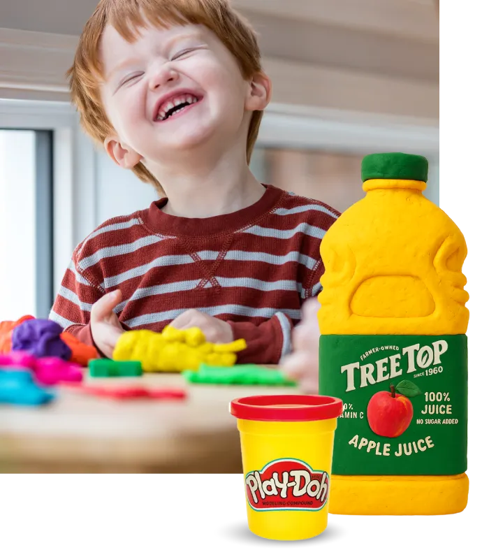 A child playing with Play-Doh.